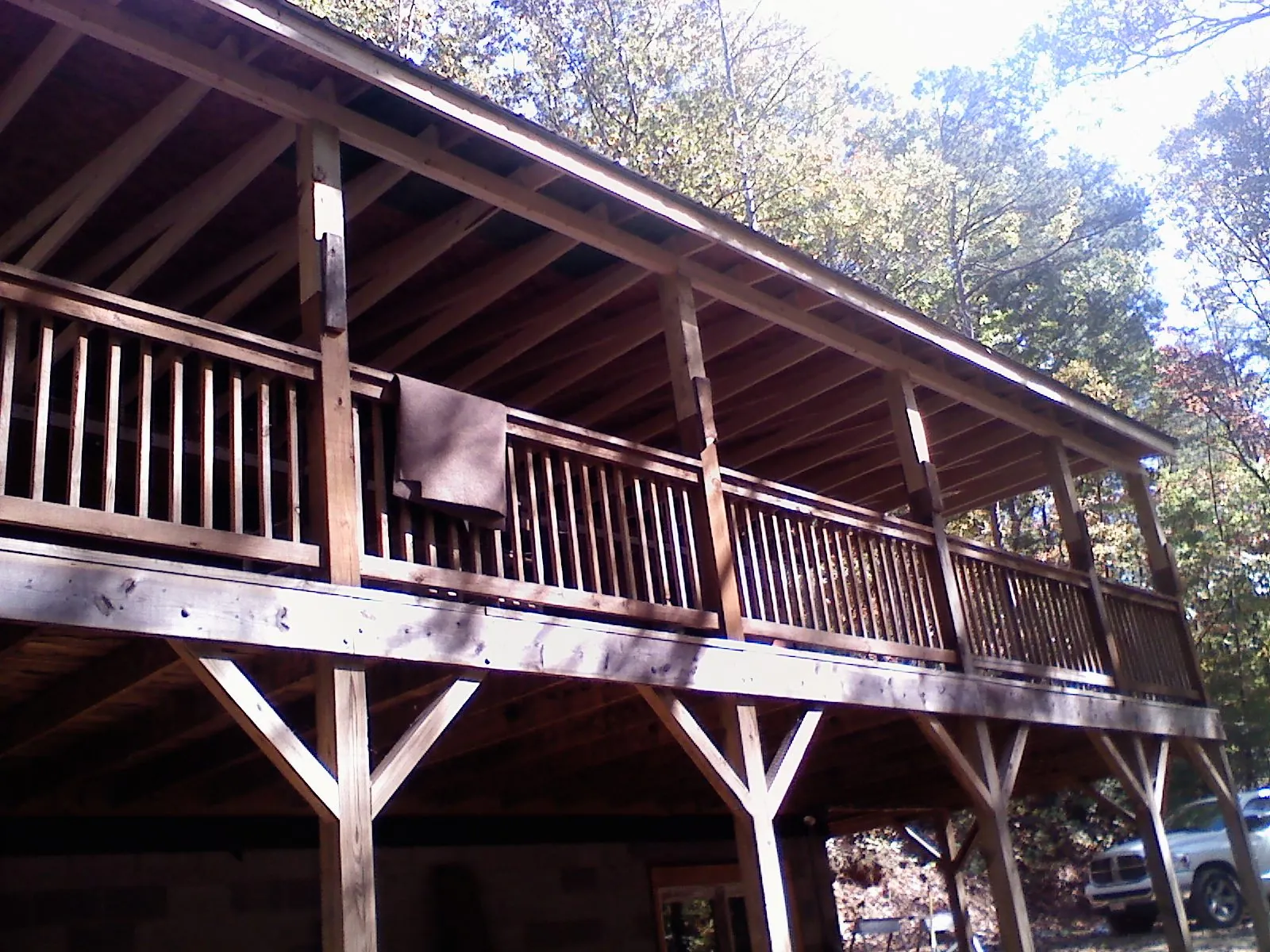 Timber framing under a new elevated porch and deck — Roof Leak Repair in Eyota by Roofing Brothers